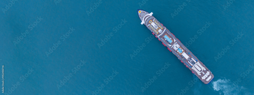Aerial view luxury ocean cruise ship on clam blue sea, Elegant modern travel lifestyle, Luxury cruise ship liner modern maritime business ocean tourism, Global business cruise ship liner industry.
