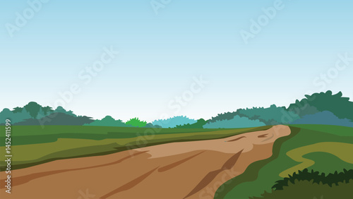 A dirt road across lush green meadows with a large forest in the distance.