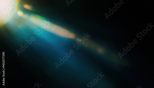  abstract light beam flare with teal and gold hues on dark background for web design, digital art, branding, posters, and multimedia backdrops