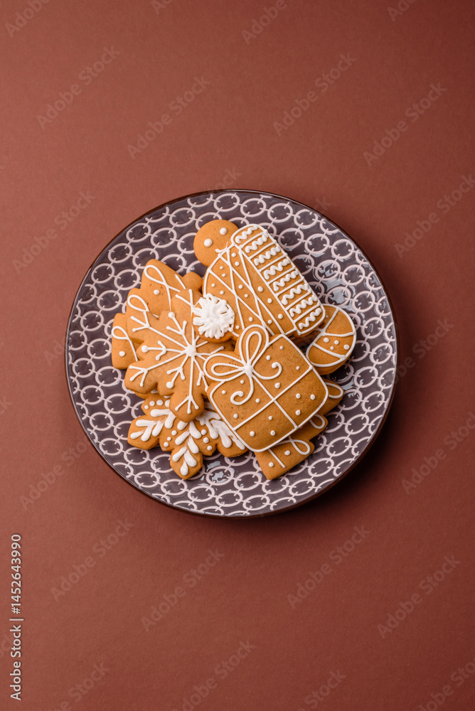 Fototapeta premium Christmas winter gingerbread, holiday biscuits on monochrome background