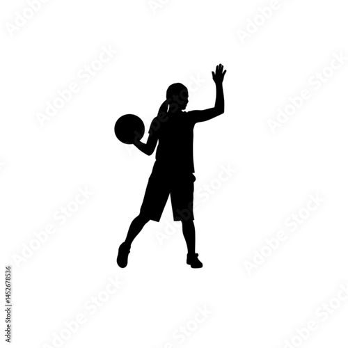 Silhouette of a girl playing basketball in action  