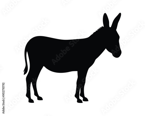 Vector silhouette of a donkey standing isolated on a white background