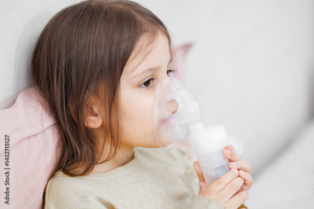child is sick in bed. inhalation at home. Mom gives medicine to her daughter. Concept disease, pharmaceutics. child is sick in bed. inhalation at home. Mom gives medicine to her daughter. Concept disease, pharmaceutics.