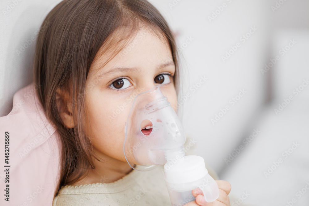 child is sick in bed. inhalation at home. Mom gives medicine to her daughter. Concept disease, pharmaceutics. child is sick in bed. inhalation at home. Mom gives medicine to her daughter. Concept disease, pharmaceutics.