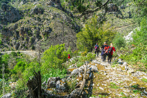 Kırkdönmeler, Gündoğmuş, Antalya, Turkey- April 26, 2025: People are hiking at Ipek You Trail and Kemer Köprü, which was built in the Seljuk period and used by caravans on the Alara River in Turkey.