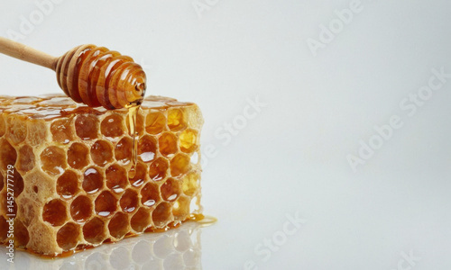 A piece of honey stuck to a wooden stick