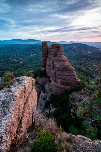 Sunrise on the edge of the mountain cliffs