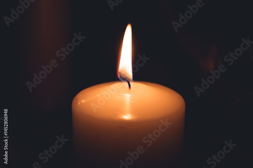 Candle burning in the church