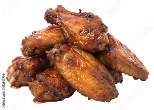 Appetizing chicken wings with glaze served on a black background ready to eat