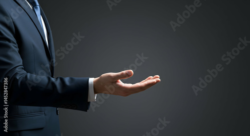 Obraz na płótnie Businessman Hand Gesture Offering Assistance or Opportunity w salonie