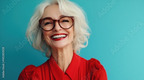 Photo portrait of pretty senior female point toothy smile wear trendy red outfit isolated on blue color background