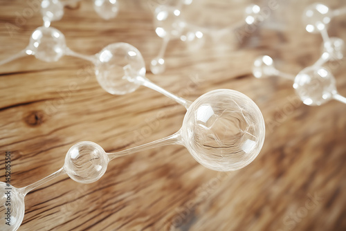 Abstract representation of fragrance molecule, geometric translucent spheres on wood texture