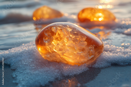 Macro shot of translucent resin stone resembling ambergris, placed on sea salt