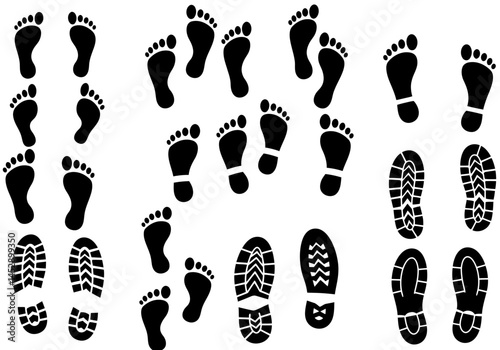 Footprints and shoe prints vector illustration, black silhouette of feet and shoes on white background image
