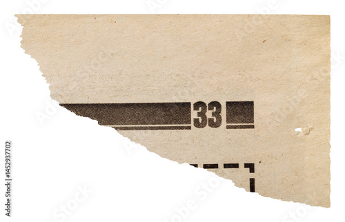 Yellowed torn numbered newspaper corner, isolated tear of old vintage page