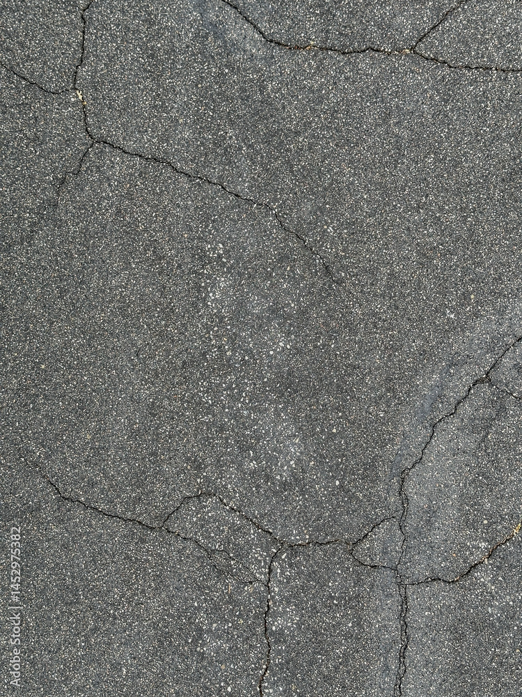 Obraz premium asphalt paving texture with cracks