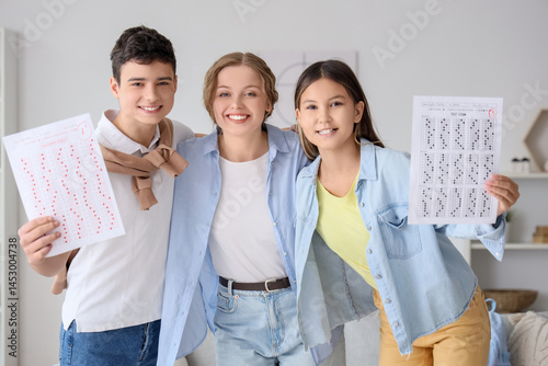 Teenage kids with results o...
