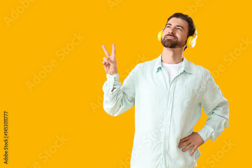 Handsome man in headphones ...