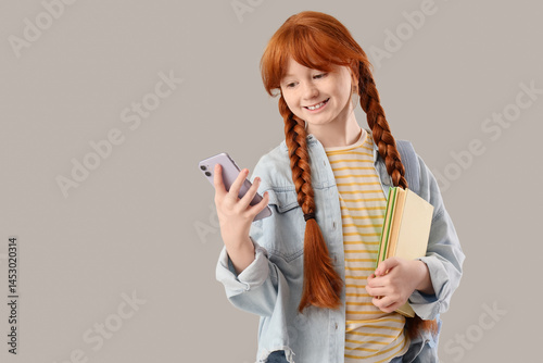 Teenage redhead girl with b...