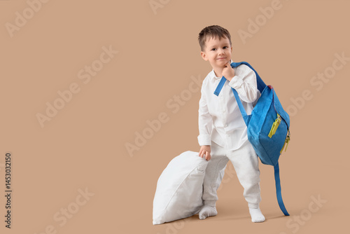 Cute little boy with pillow...