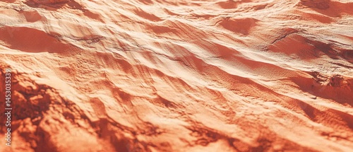 Abstract view of textured, rusty-colored landscape.