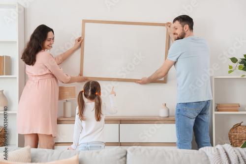 Happy family hanging blank ...