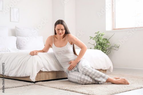 Young woman feeling discomf...