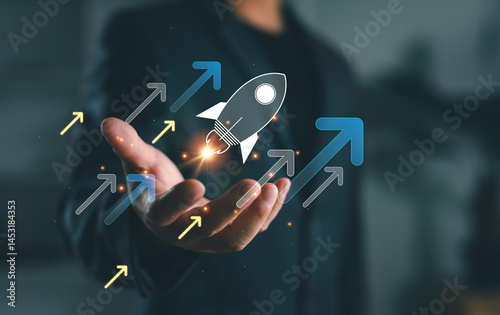Fotografi Businessman hand launching rocket with upward arrows, symbolizing startup growth, business launch, innovation, support, entrepreneurship, progress, and successful development strategy