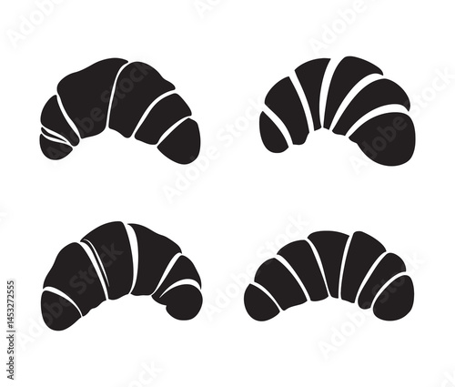 Set of black and white croissants. Silhouette croissant on a white background.