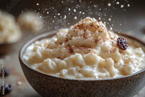 A bowl of muesli with nuts and cinnamon.