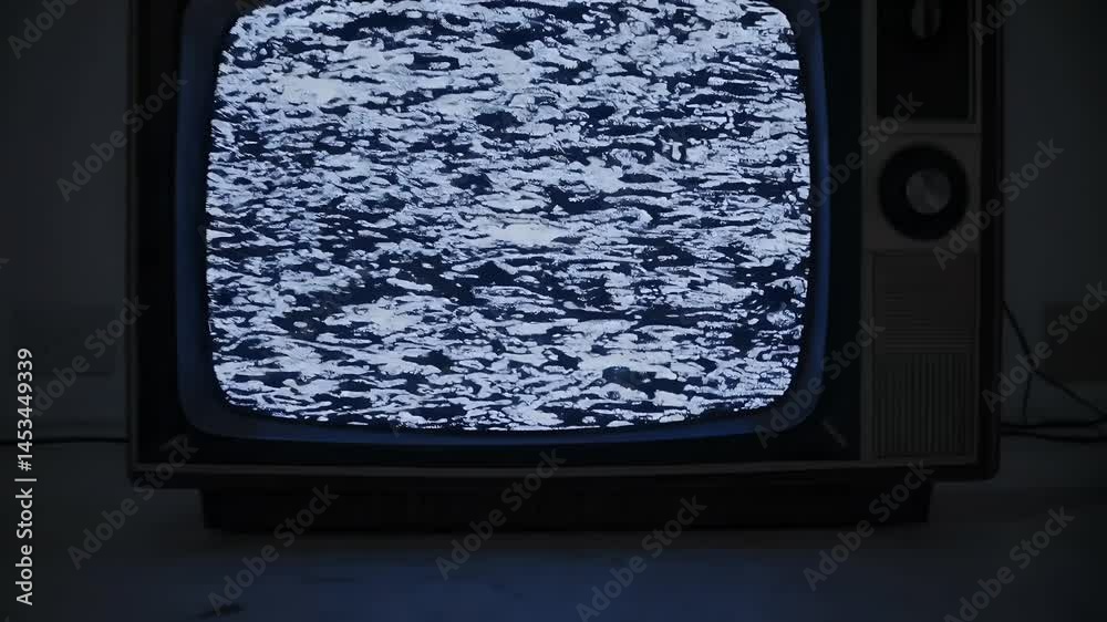 Glitchy retro TV displaying fluctuating sound waveforms static filled screen symbolizing loud music volume increase nostalgic end of broadcast signal interference