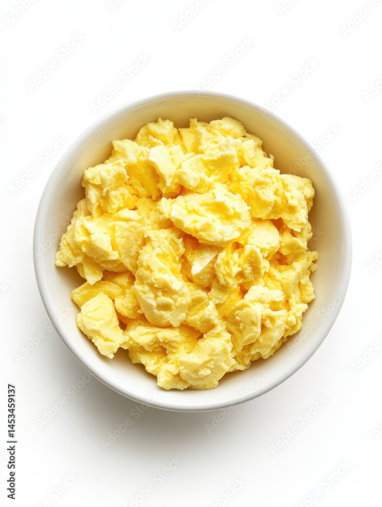 Scrambled eggs in a white bowl on a white background perfect for breakfast or brunch simple and delicious Scrambled eggs in a white bowl on a white background perfect for breakfast or brunch simple and delicious