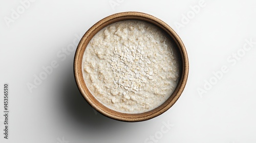 Creamy Porridge Bowl Captured From Above on a Minimal White Background