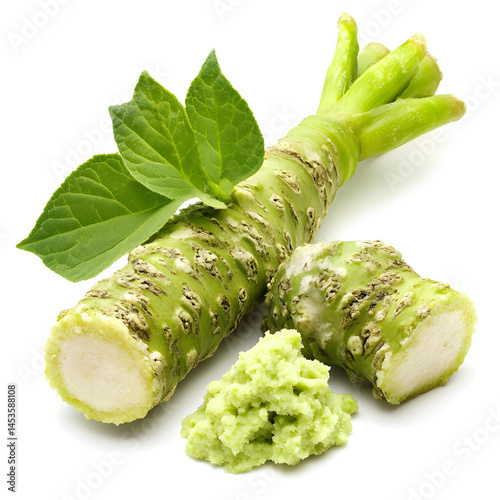 Fresh wasabi root with grated paste and green leaves on white background