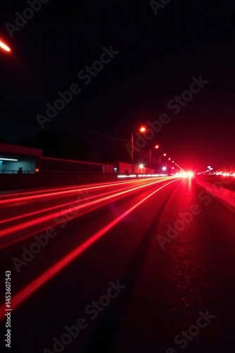 Red light trails, high-speed motion blur on black backdrop , power, light, warp
