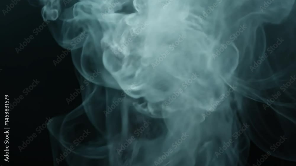 Abstract Smoke Swirls: A mesmerizing close-up showcases ethereal smoke, its intricate swirls and wisps creating a sense of mystery and artistic expression. Abstract Smoke Swirls: A mesmerizing close-up showcases ethereal smoke, its intricate swirls and wisps creating a sense of mystery and artistic expression.