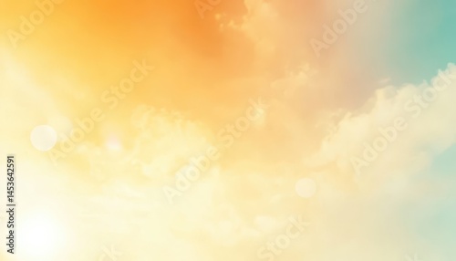 Serene Sky with Gradient of Yellow Orange and Blue Hues featuring Soft Clouds Creating a Dreamy and Artistic Pastel Colored Background in Bright Sunlight