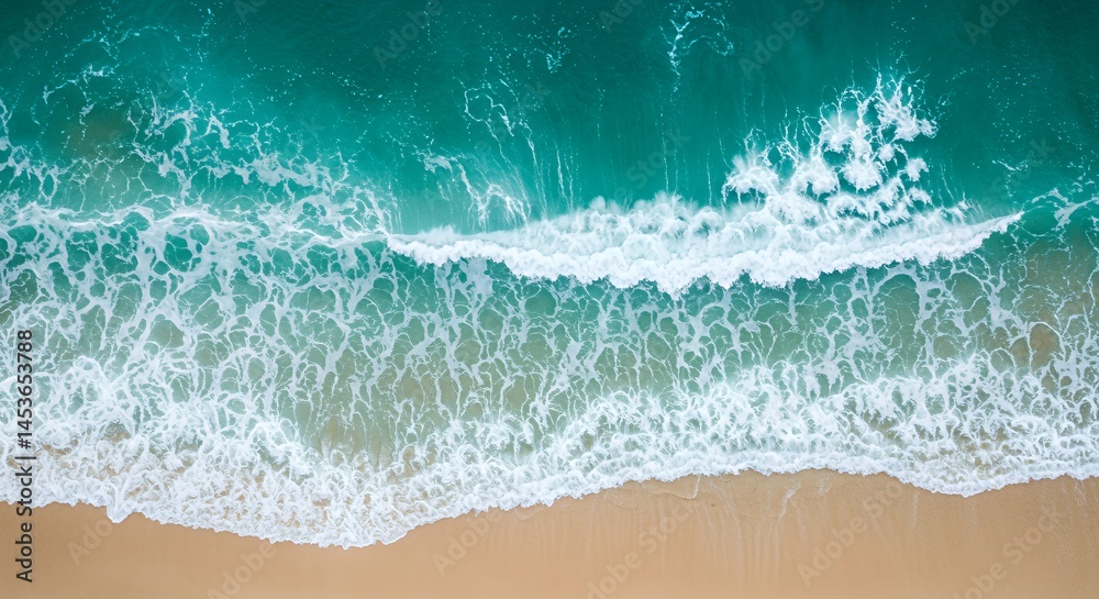 Aerial View of Turquoise Ocean Waves Crashing on Sandy Beach