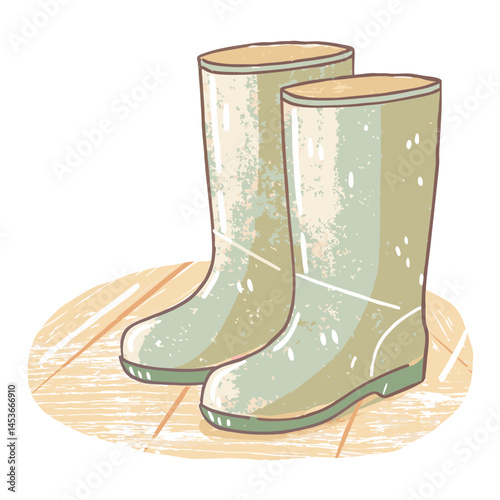 Stylish green rubber boots standing on a wooden floor, representing rainy weather gear and outdoor activities for protection and comfort.