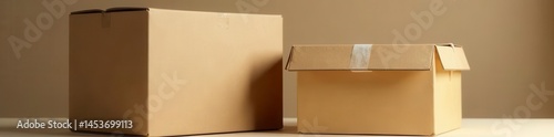 Two sturdy closed cardboard boxes, one larger than the other , surface, dimensions, cardboard