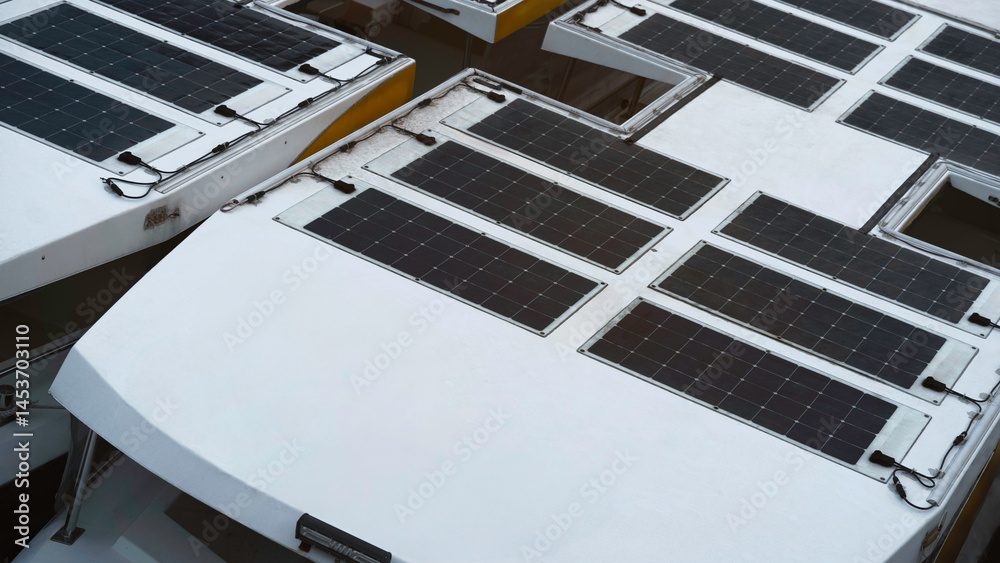 solar-powered boat docked on shore, traveling electric propulsion system under bright sunlight, reflects sustainable technology, peaceful maritime lifestyles future of green transportation.