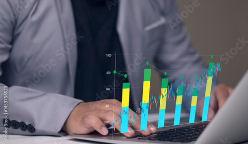Business cost and quality analysis for performance optimization. businessman typing on keyboard with a digital overlay of graphs, showcasing trends, insights, and efficiency.