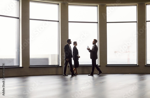 Photography Real estate agent or broker showcasing, business couple, happy to rent new empty