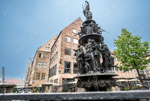 Nuremberg, Germany, August 2, 2023. Shot on a rainy day of the Tugendbrunnen fountain, Fountain of the Virtues, near the church of St. Lawrence.