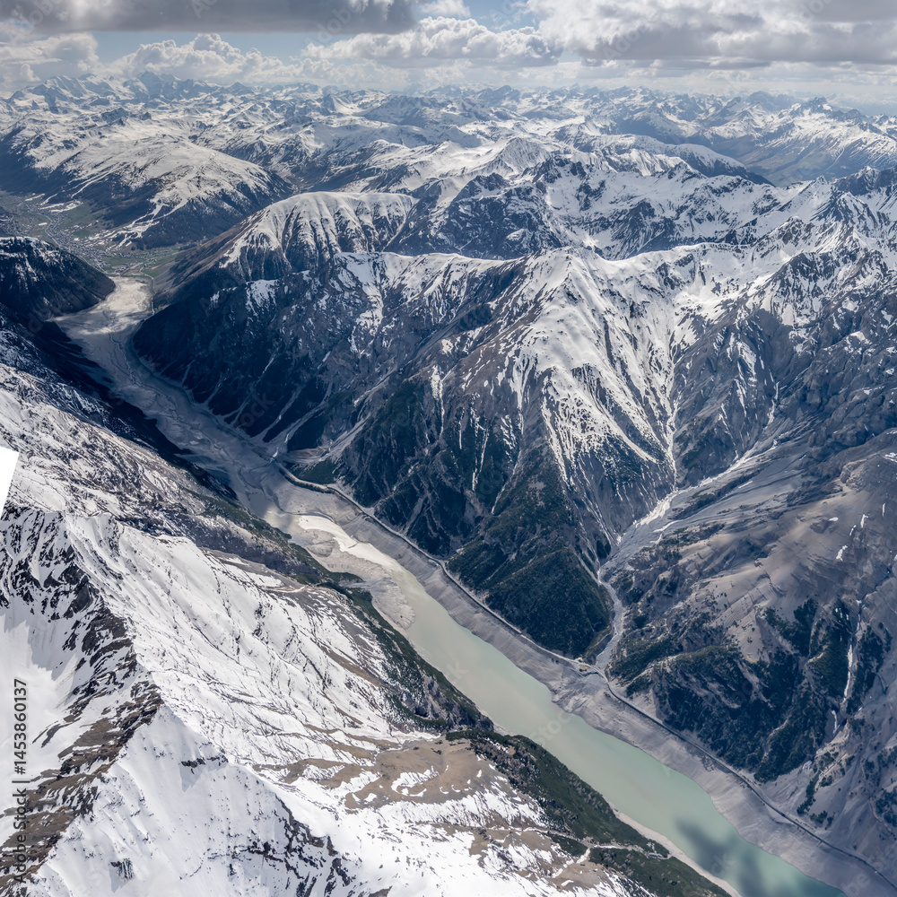 aerial landscape with Livigno lake southern side, Italy