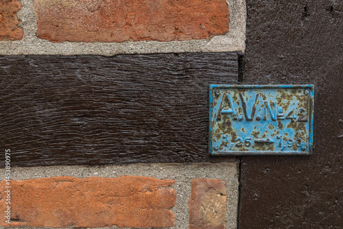 Brick wall with black timber, historic architecture in Ystad, Sweden.