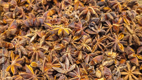 Anise or star anise are on the counter in the supermarket. Prepared for sale.