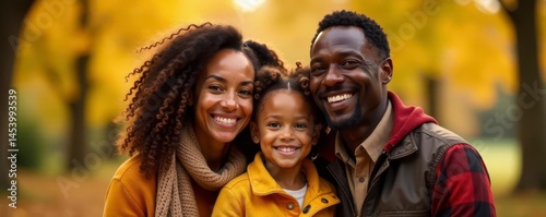Smiling multigenerational Black family autumn outdoor portrait, joyful, bonding, multigenerational