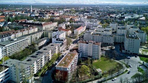 View of Munich from above, from Westpark. A sunny day after a rain, a bright horizon. Aerial shot, drone.
