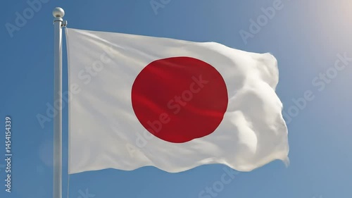 A realistic image of the Japanese flag gently waving in the morning breeze, illuminated by soft golden sunlight. The red circle stands out vividly on the white fabric, moving gracefully.